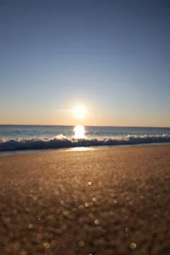 Sunset ocean waves Stock Photos