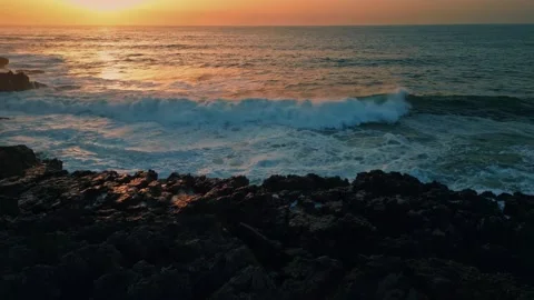 Sunset ocean waves, rocky coast sunset, crashing wave shoreline Stock Footage 311094941