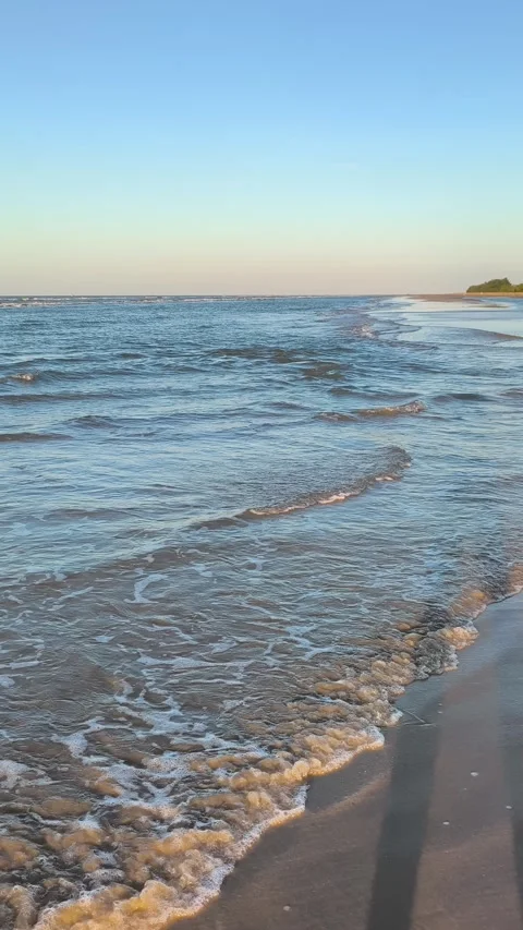 Sunset Ocean Waves on Sandy Beach - Vertical Tropical Coastline Stock Footage 340380610