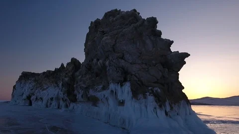 Sunset Ogoy Island Sharp rock icel ake Baikal Russia splash Winter Aeriaal 4k Stock Footage 88167875