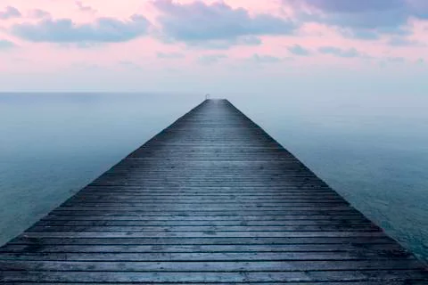 Sunset on the old pier Fotos de archivo