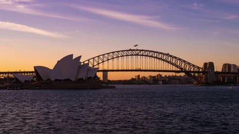 Sunset of the Opera house and the harbour bridge in Sydney ProRes-422 4K 29.97 Video stock 76014725