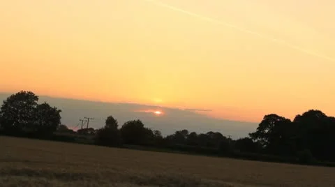 Sunset or sunrise on fields in country Stock Footage 10704360