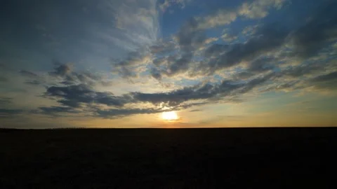 Sunset or sunrise. The rapid movement of clouds. Timelapse 動画素材 188697214