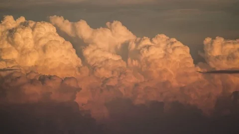 Sunset orange puffy clouds close up Stock-Footage 83756968