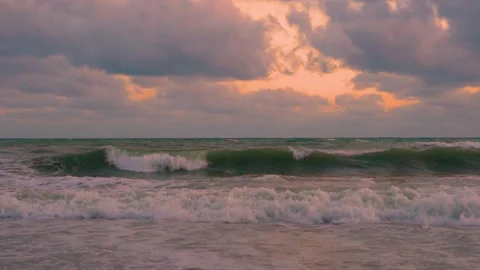 Sunset Orange Sky Purple Gray Rain Clouds in Sunlight Ocean Waves Super Slow Mot 스톡 동영상 304665218