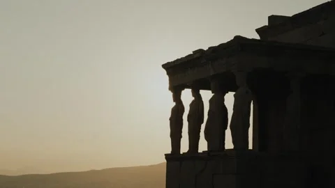 Sunset Over the Acropolis of Athens with Silhouette of Caryatids Stock Footage 342063731