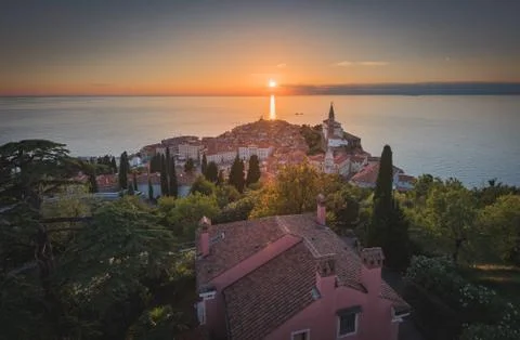 Sunset Over Adriatic Sea and Old Town of Piran, Slovenia Stock Photos