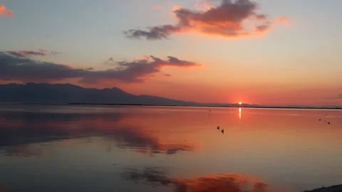 Sunset Over the Aegean Sea with Reflections (Slow Motion) Video stock 234317037