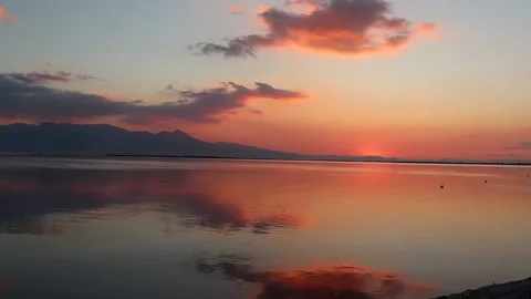 Sunset Over the Aegean Sea with Reflections (Slow Motion) Stock Footage 234317310