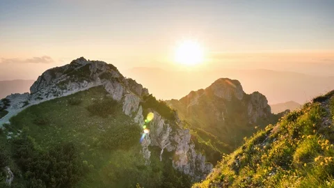 Sunset over alpine mountains ridge Time lapse Beautiful Nature Stock Footage 112781586