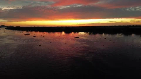 Sunset over amazon rainforest during monsoon season. Aerial dolly out Stock Footage 242317261
