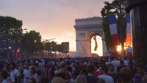 Sunset over Arc de triomphe in Paris after the victory of France at the 2018 Stock Footage 92332416