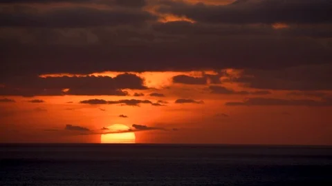 Sunset over the Atlantic ocean from the coast of Cornwall, England Stock Footage 115529987