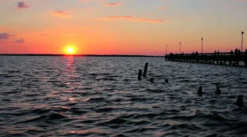 Sunset over the bay and pier Stock Footage 12202601