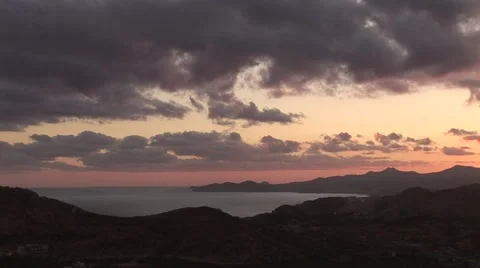 Sunset Over Bay From Mountains With Clouds Stock Footage 1012434