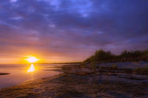 Sunset over the bay Stock Photos