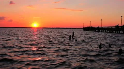Sunset over bay time lapse Stock Footage 12202478
