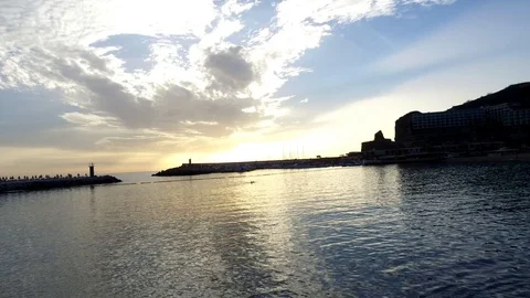 Sunset over the beach and ocean in the evening in Puerto Rico Gran Canaria Spain Video stock 86114094