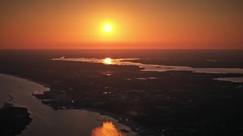 Sunset over Beach and Ocean and Bay in Biloxi Stock Footage 314015480