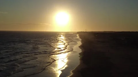 Sunset Over Beach and Wind Turbines Necochea Argentina Stock Footage 314408429