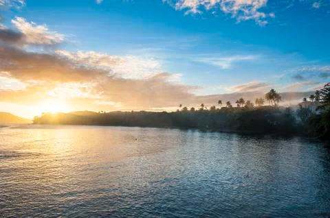 Sunset over the beach of safe landing resort, nacula island, yasawas, fiji, s Stock Photos