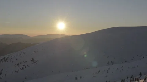 Sunset over beautiful snow mountains Stock Footage 83062490