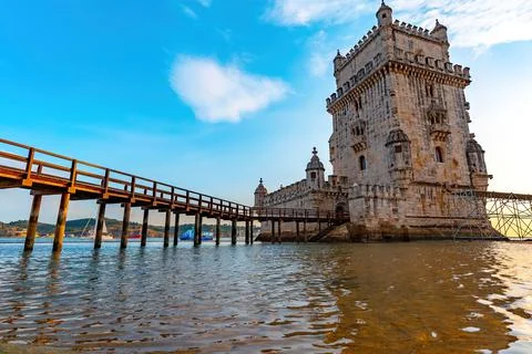 Sunset over Belem tower in Lisbon Stock Photos