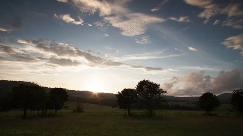 Sunset over big field at Tung Salang Luang National Park, timelapse 4k Stock Footage 76854961
