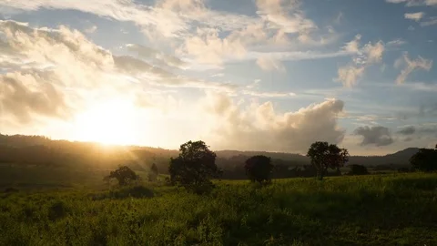 Sunset over big field at Tung Salang Luang National Park, timelapse 4k Stock Footage 77329188