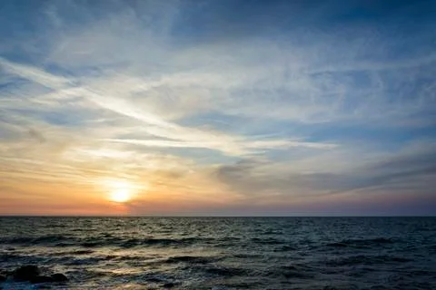 Sunset over the black sea, dramatic and vibrant sky.. Stock Photos