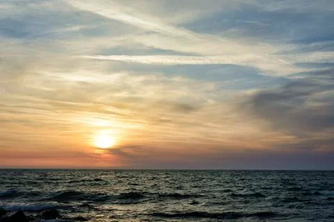 Sunset over the black sea, dramatic and vibrant sky.. Stock Photos