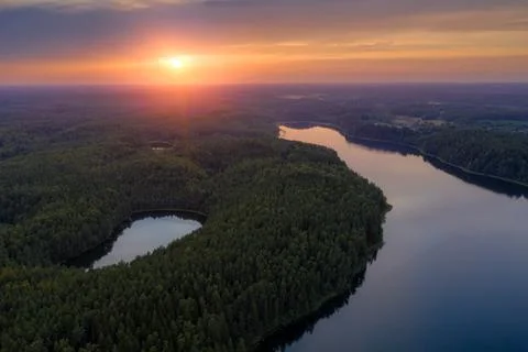 Sunset over blue lakes Stock Photos
