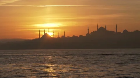 Sunset over Blue Mosque and Hagia Sophia Stock Footage 166156144