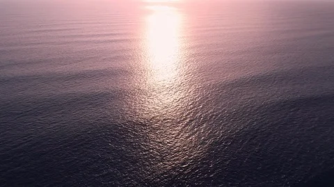 Sunset over the blue ocean Stock Footage 102996154