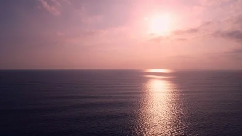 Sunset over the blue ocean Stock Footage 106719735