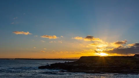 Sunset over Blyth and Cambois timelapse with fishermen Stock Footage 101193383