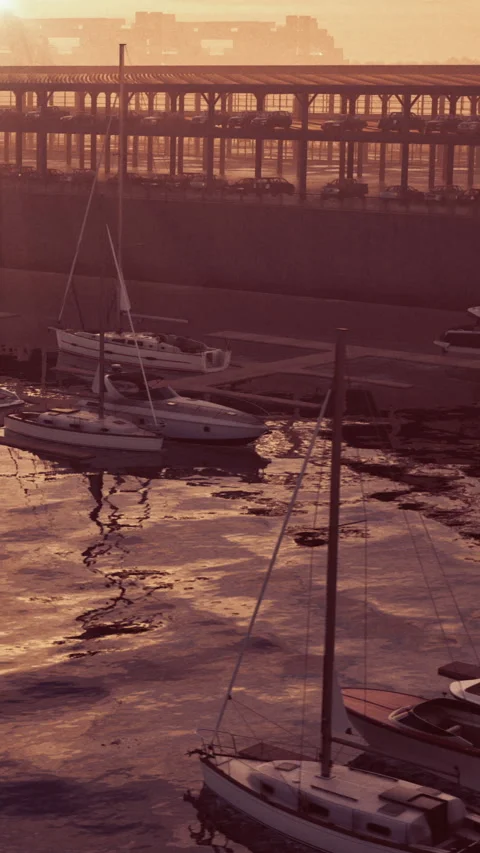 Sunset over boats at dock with shining water reflections in city harbor Stock Footage 340649387