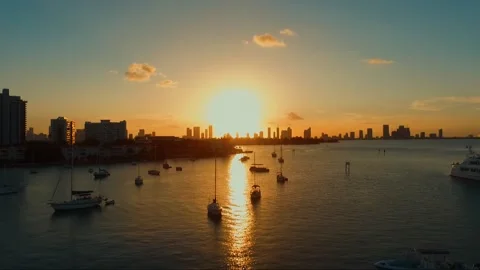 A sunset over a body of water Video stock 155459431