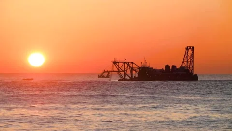 A sunset over a body of water Stock Footage 155540583