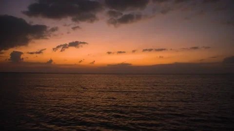 A sunset over a body of water 動画素材 155583235