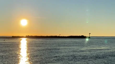A sunset over a body of water Stock Footage 155584771