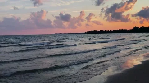 A sunset over a body of water Stock Footage 155593269