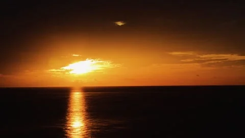 A sunset over a body of water Stock Footage 155594358