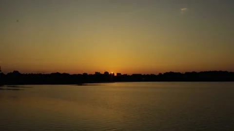 A sunset over a body of water Stock Footage 156013577