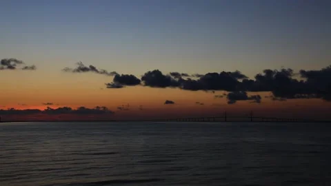 A sunset over a body of water Stock Footage 156013867