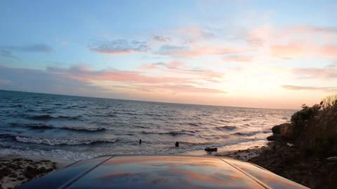 A sunset over a body of water 動画素材 156024271