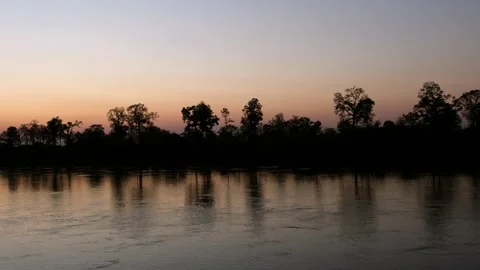 A sunset over a body of water Stock Footage 157871360