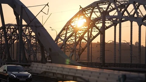 Sunset over the bridge in the city Stock Footage 112136582