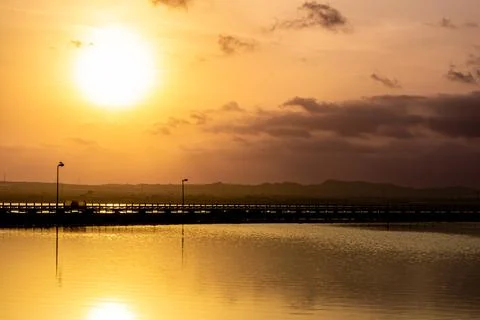 Sunset over a bridge Stock Photos